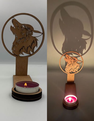 Wooden wolf tealight holder casting a mystical howling wolf shadow on the wall, handmade decorative candle holder. 🐺🕯️